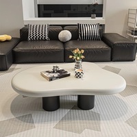 Table basse nuage minimaliste moderne en bois organique irrégulier avec pieds sphériques pour salon et appartement