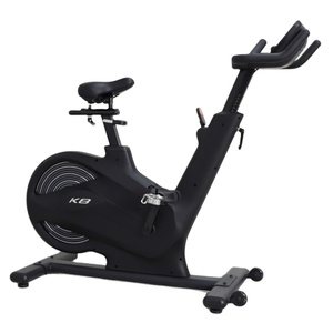 Bicicleta de <span class=keywords><strong>Spinning</strong></span> Magnética K-FIT GSP2303 con Pantalla LED, Volante de Inercia de 18 kg, Transmisión por Correa Autoalimentada, Consola Bluetooth, Ciclismo Indoor - Product Image 1