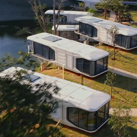 Maison capsule intelligente de luxe moderne préfabriquée portable mobile de 40 pieds pour projet de site de camping
