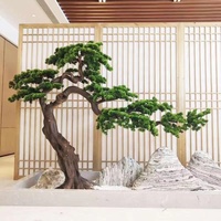 Usine simulée invité-salutation pin plante aménagement paysager Luohan jardin restaurant hôtel décor blanc grand pin arbre artificiel