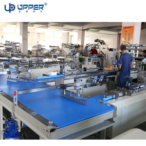 Ligne d'emballage alimentaire électrique automatique brevetée CE ISO UPPER pour les barres de bonbons et de chocolat Système d'emballage d'alimentation par oreiller en plastique - Product Image 4