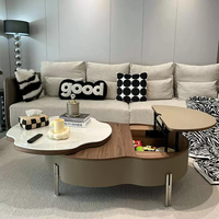 Table basse rotative en forme de pétale, style moderne minimaliste, luxe léger, haut de gamme, nouvelle collection, pour salon.