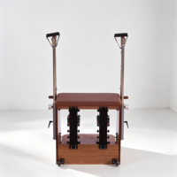 Chaise Wunda en bois de noyer de qualité supérieure avec pédales séparées, compacte, durable, idéale pour les studios de boutique et les entraîneurs privés