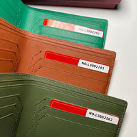 Portefeuille en peau de vache design personnalisé en gros Portefeuille court de luxe en cuir véritable pour hommes et dames
