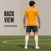 Tenue de football personnalisée camouflage orange, ensemble maillot et short respirant à manches courtes pour l'entraînement quotidien de l'académie de football