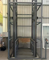 Plateforme de levage hydraulique robuste Risenmega 1t avec rail de guidage vertical pour manutention de matériaux 12m en acier au manganèse Q345B CE ISO9001