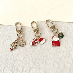 Llaveros Metálicos Navideños de Alta Calidad con Diseño de Santa Claus, Muñeco de Nieve y Árbol de Navidad, Venta al Por Mayor - Product Image 1