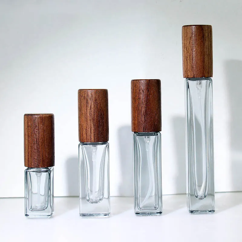 Venta al por mayor nuevo perfume cuadrado Premium aceite esencial botella transparente 3ml 5ml 10ml botella de perfume de vidrio con tapa de nuez