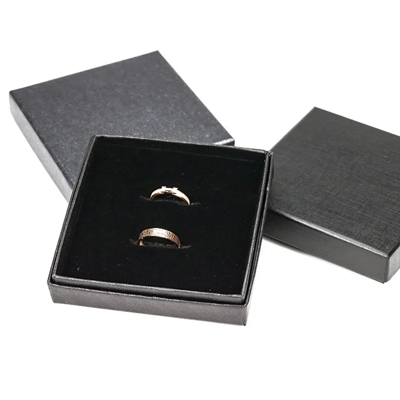 Black box with lid of customized design and logo insert for ring earring