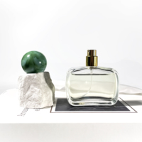 Vente en gros de flacons de parfum vides rectangulaires de nouvelle conception, atomiseur de parfum, pompe de pulvérisation, flacon de parfum transparent pour huile d'olive, 50 ml