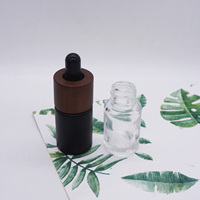 Flacon d'emballage de cosmétiques de luxe, 10 pièces, bouteille en verre noir givré avec capuchon en bambou foncé, 15ml