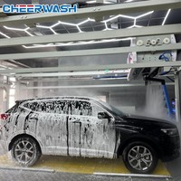Machine de lavage de voitures automatique avec détection intelligente des véhicules et technologie de distance de lavage réglable