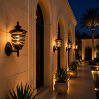 Lanterne murale décorative d'extérieur avec cadre en métal en spirale pour l'éclairage des jardins de villas