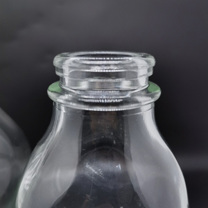 32 ออนซ์ ขวดแก้วใสทรงเหลี่ยมขนาด 1000 มล. <span class=keywords><strong>1</strong></span> ลิตร พร้อมฝาพลาสติกสีขาวแบบล็อคป้องกันการแกะขนาด 48 มม. รุ่น 48-Snap - Product Image 4