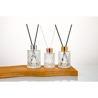 Flacon diffuseur de parfum en verre rond transparent de luxe vide de 50 ml et 100 ml avec bouchons à vis – Vente en gros