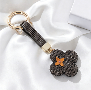 พวงกุญแจรูปใบโคลเวอร์สี่แฉกประดับเพชรเต็มใบ ดีไซน์หรูหราทันสมัย เข้าได้กับทุกชุด ใช้ตกแต่งกระเป๋าหรือพวงกุญแจรถยนต์ - Product Image 6