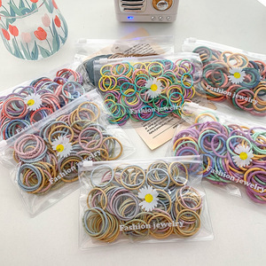 100 unids/lote de lazos pequeños para el cabello, bandas de goma de nailon coloridas, accesorios para el cabello, bandas elásticas negras para el cabello para niños - Product Image 1