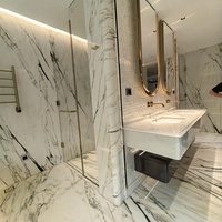 Lavabo mural en marbre Calacatta Viola, pierre italienne de luxe, contemporain et écologique, pour hôtel et villa