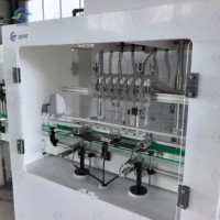 Machine de remplissage automatique anti-corrosion de 2000 BPH pour liquides, idéale pour les produits chimiques corrosifs et agrochimiques