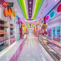 Ouyee Étagères de présentation géantes pliables pour décoration de boutique de chocolat, mobilier coloré pour confiserie avec garantie de 3 ans pour la vente au détail