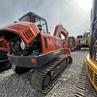 Excavadora de orugas mini Doosan DH55 original usada de Corea, 5.5 toneladas, pocas horas, en stock, con motor y bomba para construcción agrícola y movimiento de tierras.
