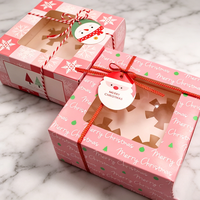 Boîte à gâteau en carton blanc festif et coloré, motif bonhomme de neige de Noël avec fenêtre découpée, pour présentation de pâtisserie de comptoir de fêtes