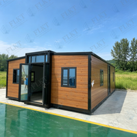 Maison conteneur extensible FLKT avec fenêtre panoramique, étanche et ignifuge, garantie 2 ans, directement de l'usine, pour un espace de vie moderne
