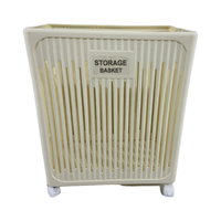 Panier de rangement en plastique avec roulettes et design respirant pour l'organisation du linge