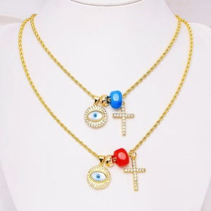 Nouveauté : Collier tendance en cuivre plaqué or avec pendentif croix et œil de diable en zircon étincelant – Cadeau pour femme - Product Image 1