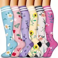 Chaussettes de compression longues en tricot respirant pour l'hiver, pour femmes et hommes, avec un design de bordure jacquard fantaisie et un emballage personnalisé