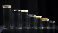Vente en gros sur mesure Bocaux en verre borosilicaté pour le stockage des aliments Boîtes en verre Récipient en bambou Bocaux en verre avec couvercle en bambou