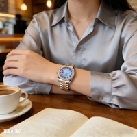 Montre pour femme de luxe avec logo personnalisé NH05, mouvement mécanique, cadran en nacre, diamants, bracelet Jubilee, verre saphir, date