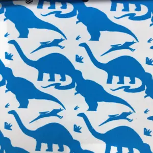 Motif de dinosaure mignon et adorable imprimé peau de pêche unie pour short de plage tissu rembourré en coton