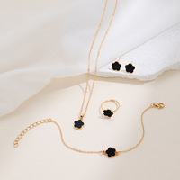 Ensemble de bijoux en alliage de trèfle porte-bonheur pour femmes 4 pièces collier bracelet anneau boucles d'oreilles cadeau de mode pour fête et usage quotidien