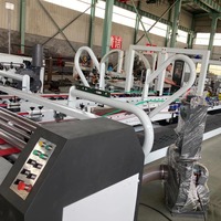 Nueva Máquina Automática para Coser y Flejar Cajas de Cartón