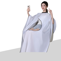 Cape de coiffure transparente avec logo personnalisé haut de gamme pour salon de coiffure Cape de coupe de cheveux antistatique non collante avec fenêtre