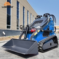 Chargeuse compacte sur chenilles certifiée EPA LOGWAY avec attache rapide pour bêche, idéale pour l'agriculture, les vergers et l'usage municipal