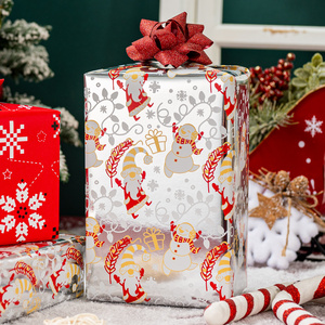 Rollo de Papel de Regalo Navideño Reversible de 17 Pulgadas x 33 Pies, con Diseño Metálico Dorado de Gnomos y Muñecos de Nieve con Copos de Nieve Plateados - Product Image 1