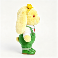 Jouet en peluche lapin jaune mignon à oreilles tombantes avec accessoire nœud, blouse à motif carotte et salopette verte