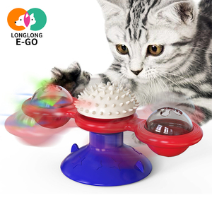 Cepillo de masaje giratorio para gatos, diseño de molino de viento, de plástico duradero, para aliviar la picazón y eliminar el pelo, juguete para el cuidado de gatos domésticos de interior. - Product Image 1