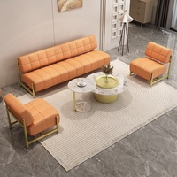 Ensemble de canapés de réception en cuir PU en forme de L, style moderne et luxueux, avec chaise combinée, pour hôtel et usage professionnel