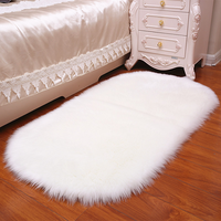 Tapis en peluche de luxe de couleur unie tapis de boule régionale tapis lavable en fausse fourrure