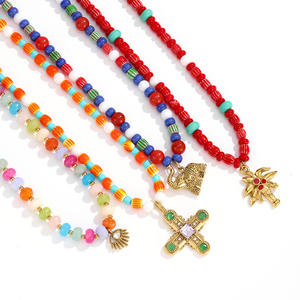 ベストセラーのクロスとヤシの木のペンダントネックレス、ビーズ付き、316Lステンレススチール製、18Kゴールドメッキ、スタイリッシュで防水のジュエリー - Product Image 1