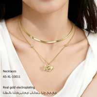 Collier ajustable double couche en acier inoxydable doré, avec pendentif exquis en forme de fleur, cœur et nœud papillon, pour clavicule