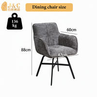 Chaise d'appoint rembourrée en tissu gris avec accoudoirs, siège rembourré, dossier incurvé et pieds en métal noir pour bureau ou salle d'étude