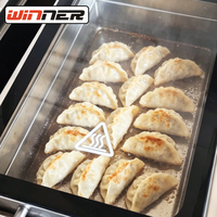 Machine à frire les raviolis commerciaux en acier inoxydable, à économie d'énergie, pour une texture croustillante à l'extérieur
