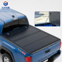 Couverture de benne pliante en quatre parties à profil bas en alliage d'aluminium pour Toyota Tacoma Fleetside 6' (73") 2016-2023 - Accessoires pour pick-up