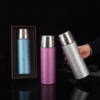Nouveau matériau personnalisé bouteille d'eau de sport ultralégère à double paroi en titane tasse d'isolation thermique pour la randonnée camping pique-nique