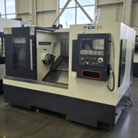 Tour à lit incliné CNC TCK56 |   Centre d'usinage horizontal à lit incliné haute précision 45°, portée 560 mm, machine robuste à usage intensif