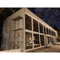 Conteneur détachable à 2 étages Bureau d'entreprise Quartier principal modulaire avec mur de verre Parc industriel